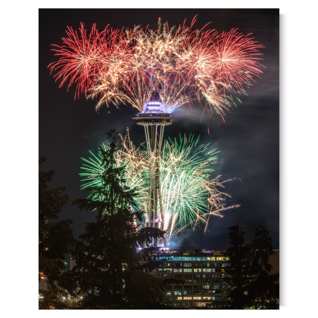 This Space Needle New Yearโs Eve fine art print captures a dazzling Seattle fireworks display, making it a stunning cityscape wall art piece. Featuring the Pacific Northwest nightscape, this urban skyline photography print is a perfect Seattle landmark photo, ideal for modern home decor, travel photography lovers, and collectors of fireworks fine art prints.